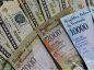 Venezuela anuncia exclusión del dólar del sistema cambiario oficial