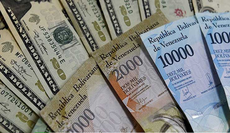 Venezuela anuncia exclusión del dólar del sistema cambiario oficial